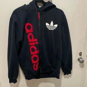 Adidas Medium men’s Zip up Hoodie with Red Adidas zipper.
